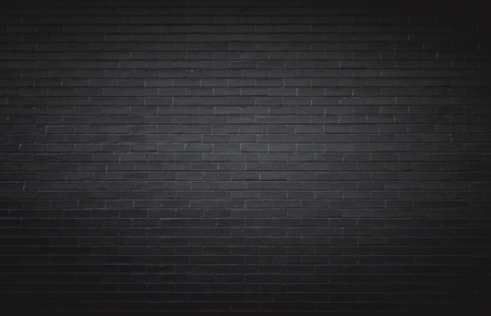 Black brick wall backgroundの写真素材