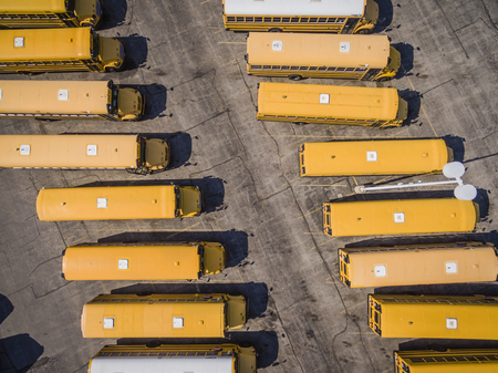Yellow School Busses aerial top view.の写真素材
