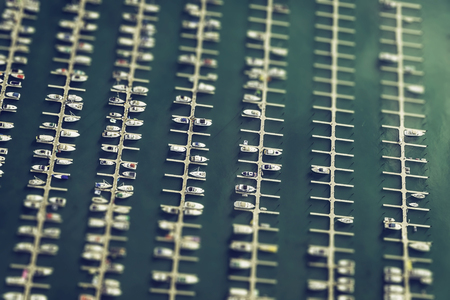 Boats parked in marina, aerial view. Tilt shift effectの写真素材