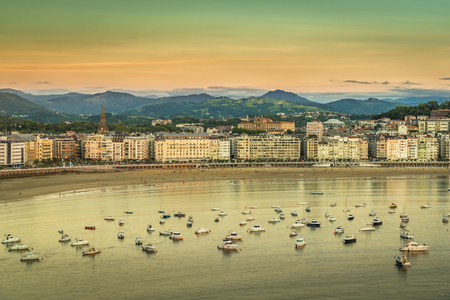 Old Town and Beach of San Sebastian, sunset light, Spainの写真素材