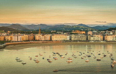 Old Town and Beach of San Sebastian, sunset light, Spainの写真素材