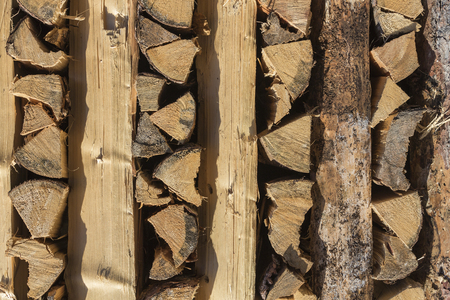Chopped Wood Pile Stacked To Dry in Alp Mountainsの写真素材