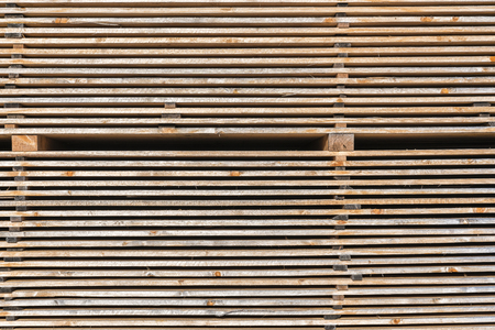 Wooden boards background at the sawmill の写真素材