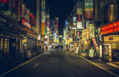 Color Billboards in Shinjuku's Kabuki Tokyo district at night,  Japan. Tilt shift effectのeditorial素材