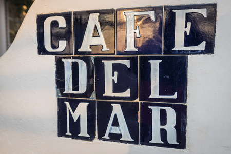 Cafe Del Mar welcome street sign during sunset. Famous chill out bar located in Ibiza, known for famous sunsets and playing lounge music.の写真素材
