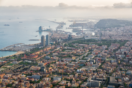 Aerial view of Barcelona city with port and harbor at sunset, Spain.の写真素材