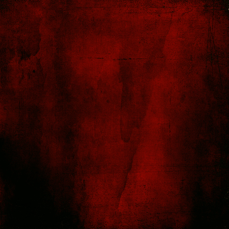 Red dark misty textured color background with scratchesの写真素材