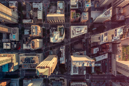 Overhead aerial view of Chicago Downtown skyscrapers. Urban grid with streets. Late afternoon lightの写真素材