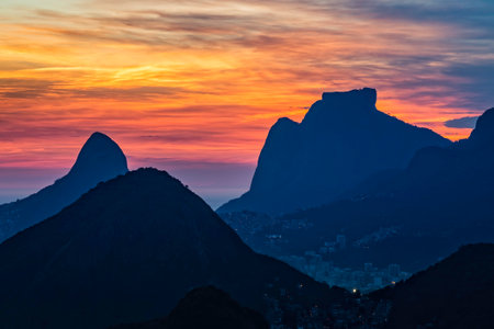 Aerial view of Rio de Janeiro with dramatic sky over the city and mountainsの写真素材