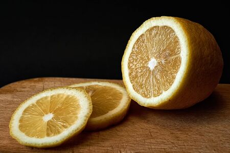 Sliced lemon on a dark backgroundの写真素材