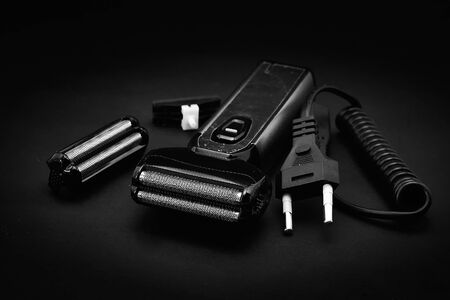 Rechargeable electric shaver for men, black backgroundの写真素材