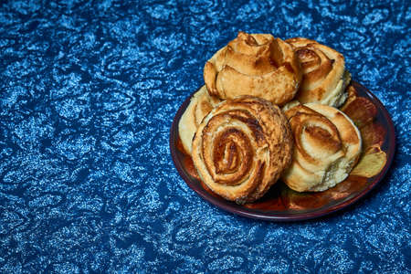 Fresh sweet homemade buns, homemade baked goods.の写真素材