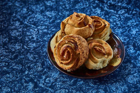 Fresh sweet homemade buns, homemade baked goods.の写真素材