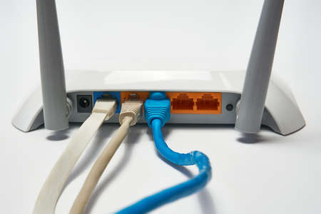 Network cable connects to wireless router, router, internet, global network