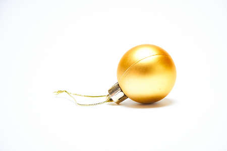 Yellow Christmas ball on a white background, New Year, Christmas toys, holiday, Christmasの写真素材