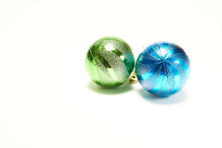 Blue and green Christmas balls on a white background, New Year, Christmas toys, holiday, Christmasの写真素材