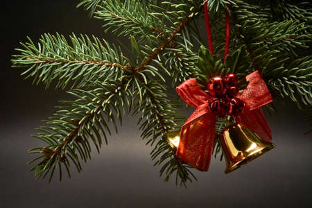 Christmas decoration with bells on a black backgroundの写真素材