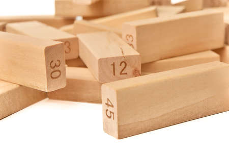 Wooden blocks of the game Tower on a white background close-up. Home entertainment