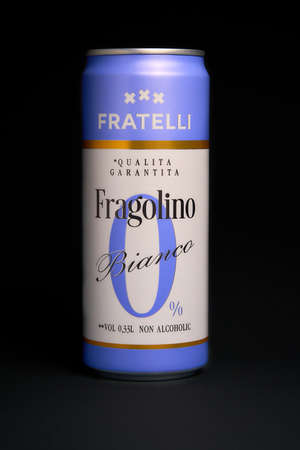UKRAINE - February 09, 2022: Fragolino bianco drink in a tin on a dark background. vertical shot.のeditorial素材