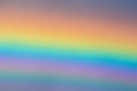 multicolored sun beam on a dark cloudy dayの写真素材