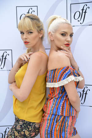 TIMISOARA, ROMANIA - June 24, 2018: Public charity event called Opera Fashion Fair. Backstage moments, portraits of beautiful blonde modelsのeditorial素材