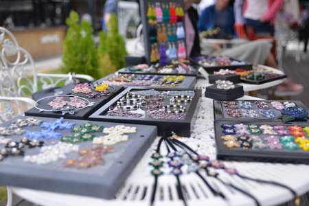TIMISOARA, ROMANIA - June 24, 2018: Public charity event called Opera Fashion Fair. Backstage moments with details of fashion designer's standsのeditorial素材