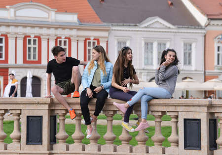 TIMISOARA, ROMANIA - March 15, 2018, Piata Unirii square: a group of teenagers are posing on the streetのeditorial素材