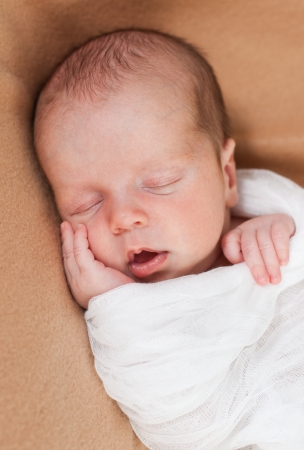 cute newborn baby boy sleepingの写真素材
