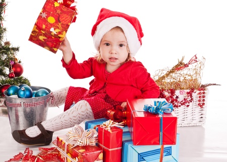 Santa helper  girl with giftの写真素材