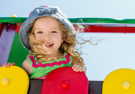 happy child having fun on the playgroundの写真素材