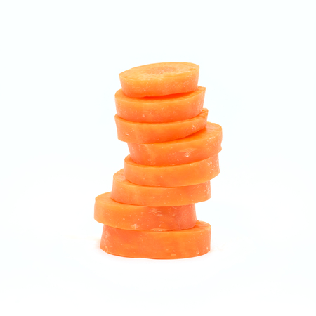 Carrot slice isolated on whiteの写真素材