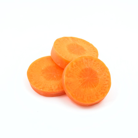 Carrot slice isolated on whiteの写真素材