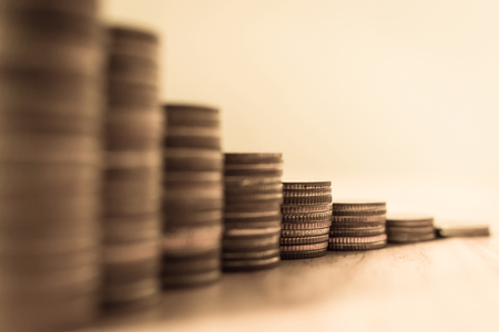 Coins stack step growing growth saving money, Concept finance business investment, selective focus, Vintage toneの写真素材