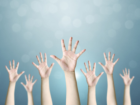 Group of hand raise up many people, International volunteer day and community service conceptの写真素材