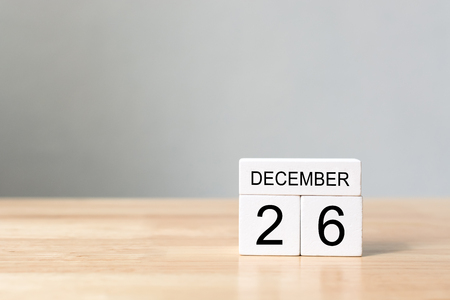 Wooden block calender 26th December on wood table with white wall background, Happy boxing day sale concept, Copy space your textの写真素材