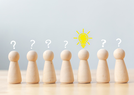 Creative thinking different new idea concept. Human wood with light bulb, question mark icon. Copy space for your textの写真素材