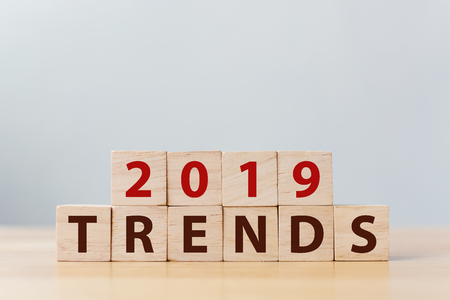 2019 trend concept. The word TRENDS on wooden cube blockの写真素材