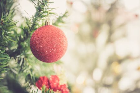Ornament christmas tree decorations on blurred backgroundの写真素材