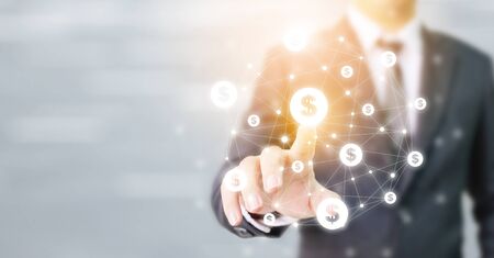 Businessman pointing dollar currency icon, Concept online transaction application for ecommerce and internet investment, Financial technology (Fin-tech)の写真素材