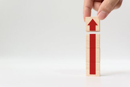 Ladder career path for business growth success process concept. Hand putting wooden block stacking...