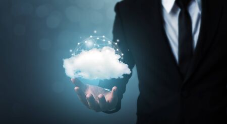 Cloud computing and technology network connection concept. Businessman hand holding cloud server...