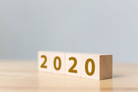 New year resolution 2020 concept. Wooden block cube with year number on tableの写真素材