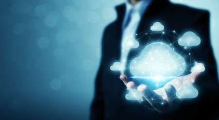 Cloud computing and technology network connection concept. Businessman hand holding cloud server...