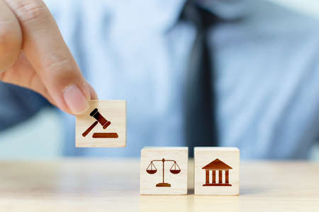 Wooden block cube shape with icon law legal justiceの写真素材