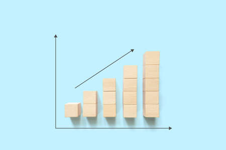 Ladder graph career path for business growth success process concept. Wood block stacking step up...