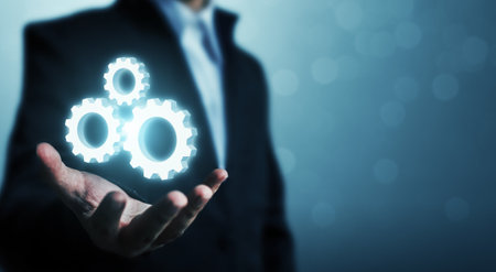 Hand showing icon gear process. Concept of automation software technology process system businessの写真素材