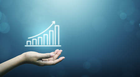 Business development to success and growing growth concept. Businessman holding graph and arrow...