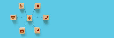 Wood block arranging with icon healthcare medical, Insurance for your health conceptの写真素材