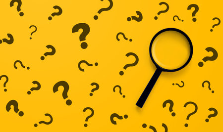 Magnifying glass and question mark sign on yellow background. Searching information data on internet networking conceptの写真素材