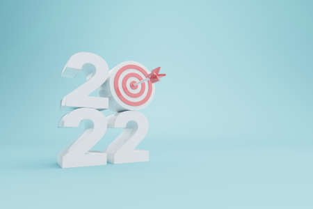New year resolution 2022. Goal achievement. Ambition aiming success. Dartboard and arrow with number. 3d rendering illustrationの写真素材